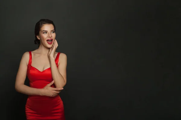 Happy Surprised Woman Red Dress Black Banner Background — Zdjęcie stockowe