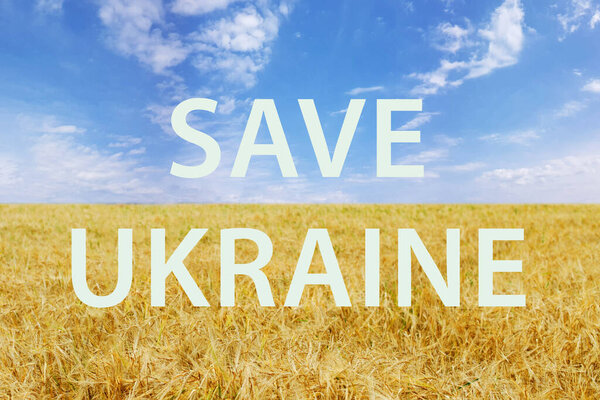 Wheat field, colors of Ukrainian flag with Save Ukraine inscription