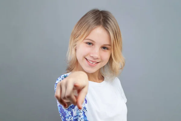 Happy Cute Young Girl Pointing Finger Gray Background — Stock Photo, Image