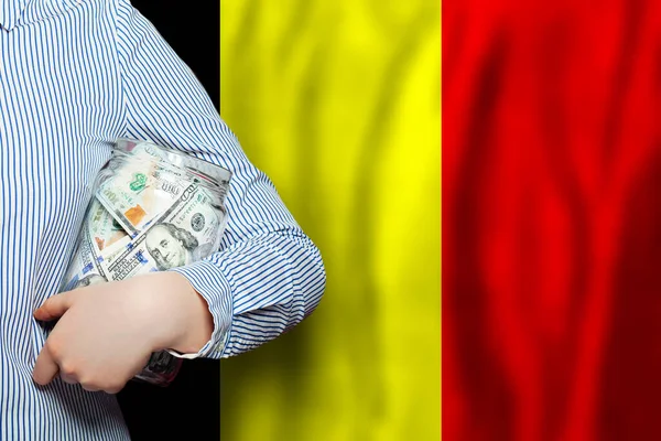 Mano Sostiene Frasco Dólares Dinero Efectivo Sobre Fondo Bandera Bélgica —  Fotos de Stock