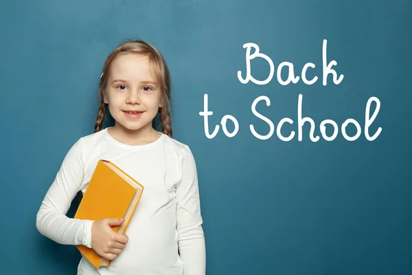 Schoolgirl Book Stands Blue Background Back School Concept — Stock Photo, Image