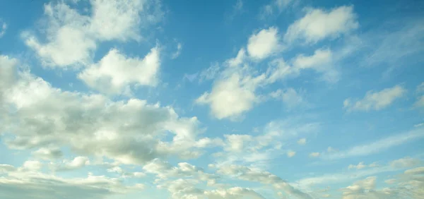 Spring sky with clouds background
