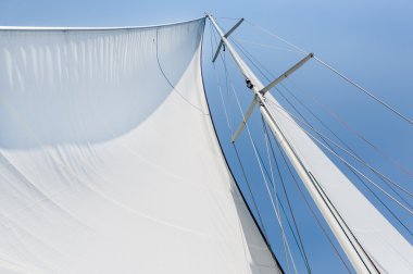 Big white sail hoisted clipart