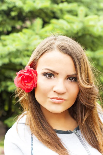 Menina com a flor — Fotografia de Stock