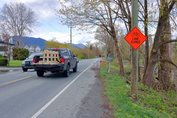 Sign Warns Cyclists Lane Closed Two Vehicles Pass Directions — Stockfoto