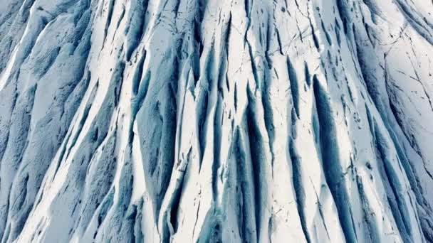 Drönare över abstrakta mönster av is och snö — Stockvideo