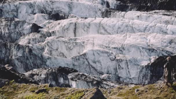 Man Hiking Along Ridge Next To Glacier — Stock video
