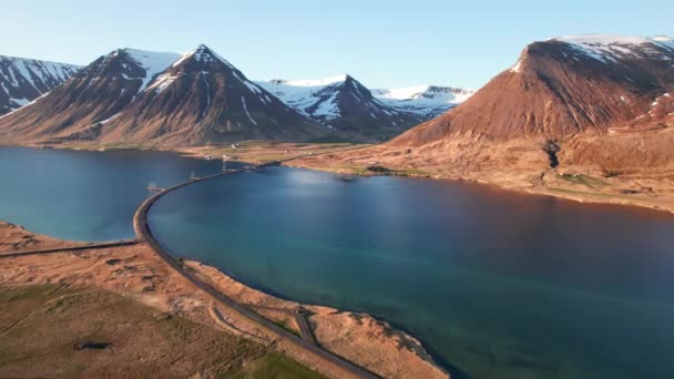 Drone Over Empty Road Over Fjords Towards Mountains — Vídeo de Stock