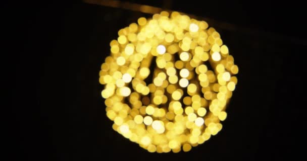 Golden Christmas Lights Arranged In Bauble Shape Coming — Wideo stockowe