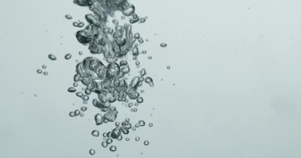 Liquid Being Poured Into Water Creating Rising Bubbles — 图库视频影像