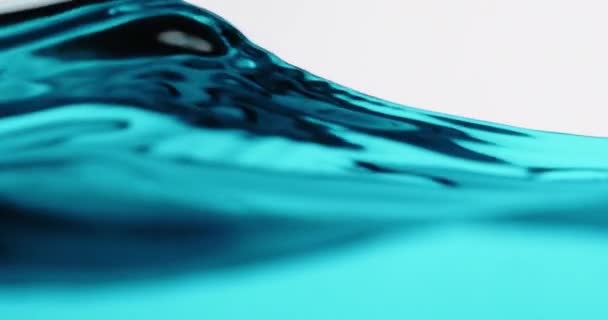 Blue Water Surface In Motion With Waves Creating Abstract Shapes — 图库视频影像