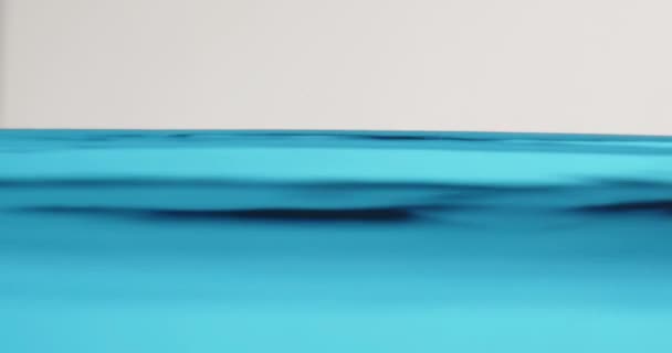 Blue Water Surface In Motion With Waves Creating Abstract Shapes — Wideo stockowe