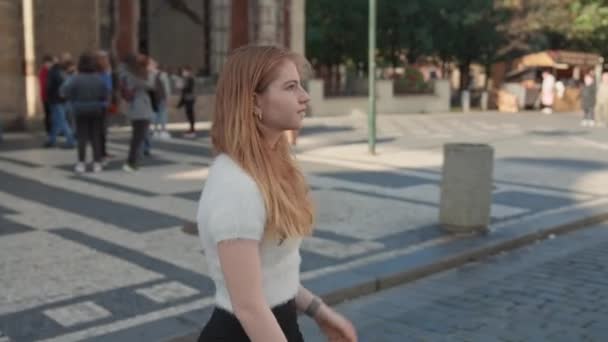 Young Woman Walking In Square In Prague — Stockvideo
