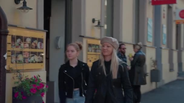 Mother And Daughter Walking Down Prague Street — 图库视频影像