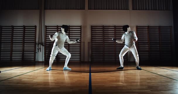 Fencers In Combat With Each Other With Their Foils — Stockvideo