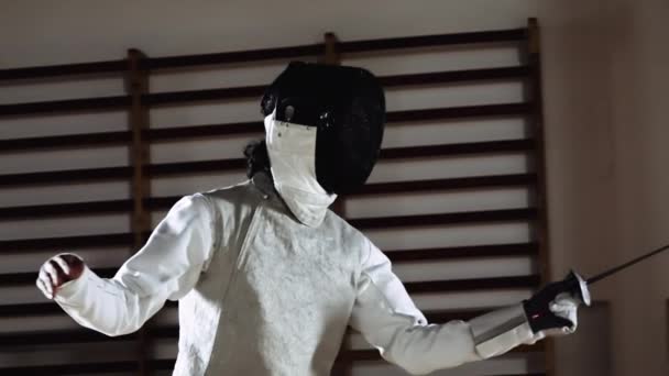 Man In Fencing Mask Parrying Opponent Running With Foil — Stockvideo