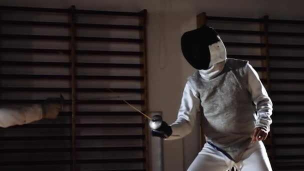 Men In Fencing Mask Thrusting With Foils In Duel — Stockvideo