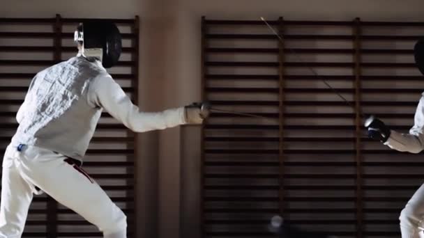 Men In Fencing Masks Thrusting With Foils In Duel — Vídeo de Stock