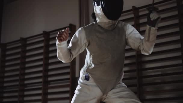 Man In Fencing Mask Duelling Opponent — Stockvideo