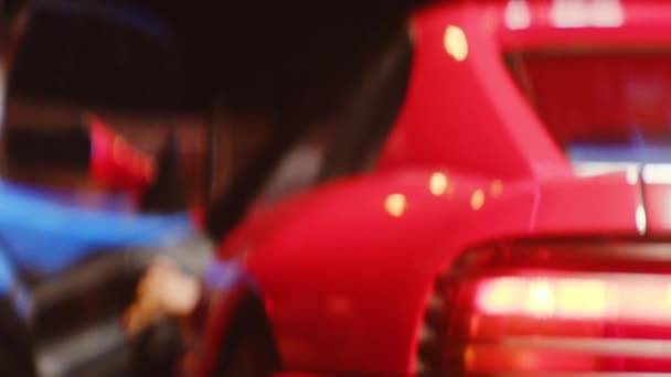 Woman With Afro Getting Out Of Driver's Seat Of Red Car — Stock Video