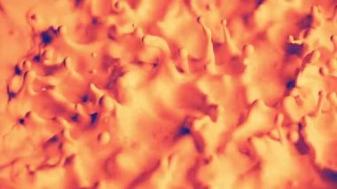 Hareket ettikçe soyut desenler turuncu boyayla şekilleniyor