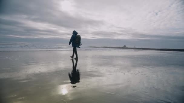 Tracking Slow Motion Wide Shot Hiker Backpack Walking Wet Reflective — 비디오