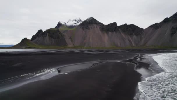 Wide Slow Motion Drone Flight Panning Black Sand Beach Sea — Stockvideo