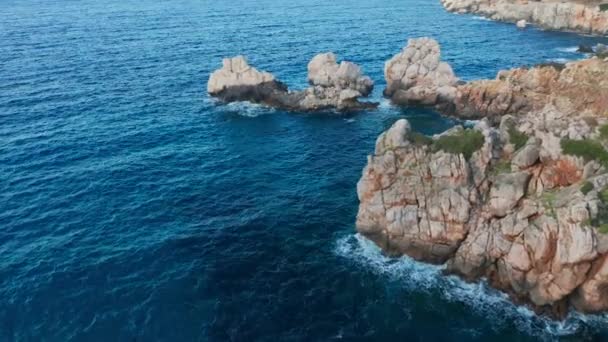 Drone Over Offshore Rock Formations In Blue Mediterranean Sea — Vídeo de stock
