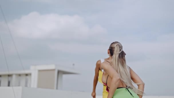 Fashion Models Dancing In Clubwear On City Roof — Stock Video