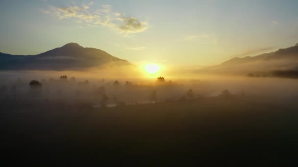 Drone Over Ethereal Misty Landscape Of Zell Am See Towards Sunrise — Stock video