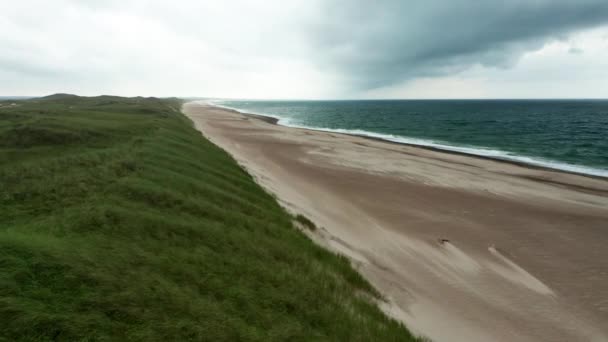 Drone Over Grass And Sandy Beach Of Jutland Coastline With Horizon — Stock video