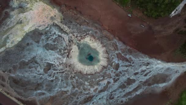 Drone Flight Over  Geyser Pool And Surrounding Geothermal Landscape — 비디오