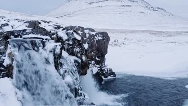 Drone From Waterfall In Snow With Kirkjufell Mountain — ストック動画