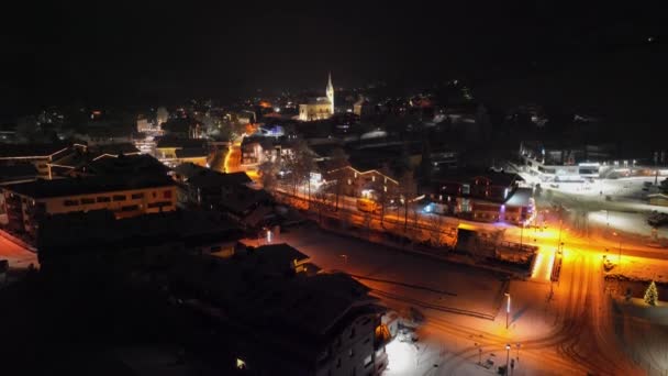 Drone Flight Rising Above Illuminated Kaprun At Night — Video Stock