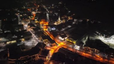 Drone Towards Illuminated Church In Kaprun At Night