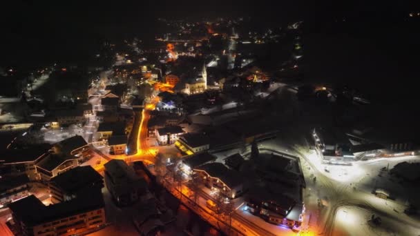 Drone Flight Arcing Above Illuminated Kaprun At Night — ストック動画