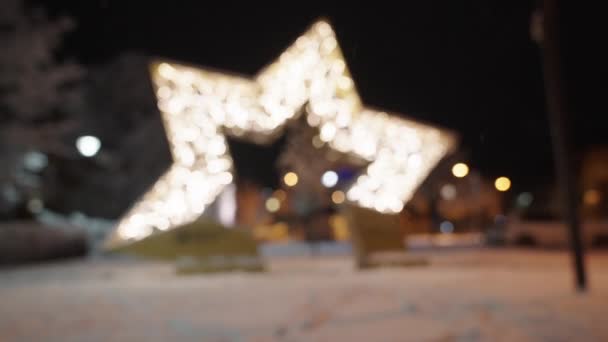 Illuminated Star Shape In Snow At Night — Vídeos de Stock