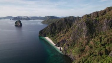 Drone Towards Island With Entalula Beach