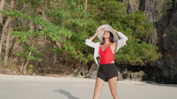 Woman Walking On Beach Of Entalula Beach — Wideo stockowe