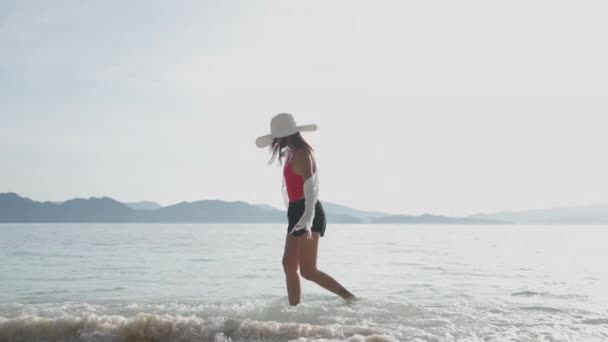 Woman Walking In Sea On Entalula Beach — Wideo stockowe