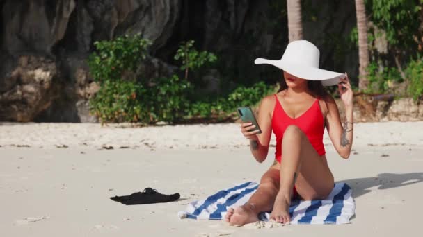 Woman Sitting On Beach Taking Selfie With Smartphone — Stock video