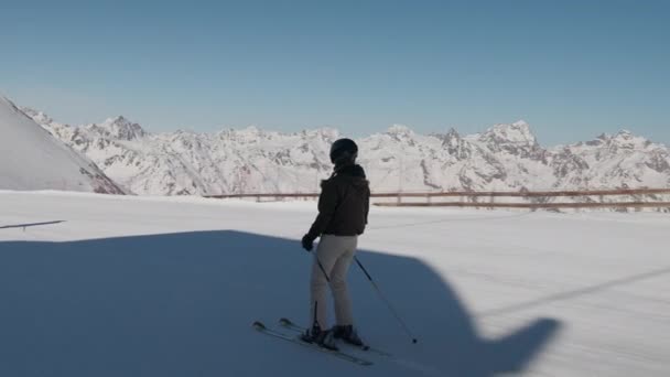 Woman Skiing Along Snow In Solden — Stockvideo