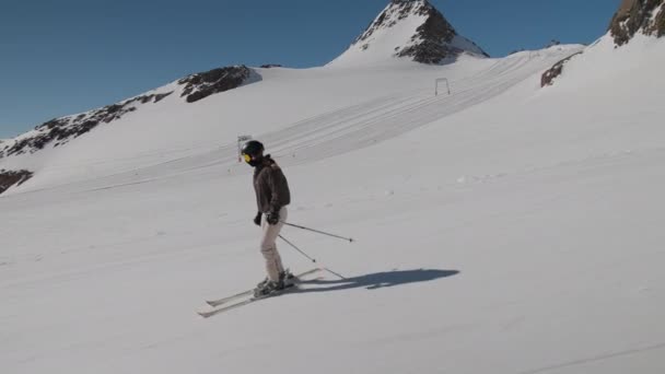 Young Woman Skiing Downhill Slope — Stock video