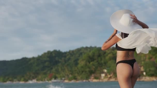 Young Woman In Thong And Sun Hat In Sea — Stock Video