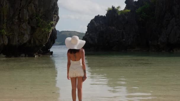 Woman In Sun Hat Standing In Shallow Sea Water — Stockvideo