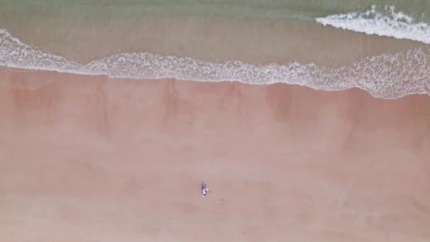 Drone Fromwoman Lying On Beach Towel On Nacpan Beach — Stock video