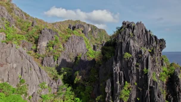 Drone From Cliff And Rocks On Hidden Beach — Stockvideo