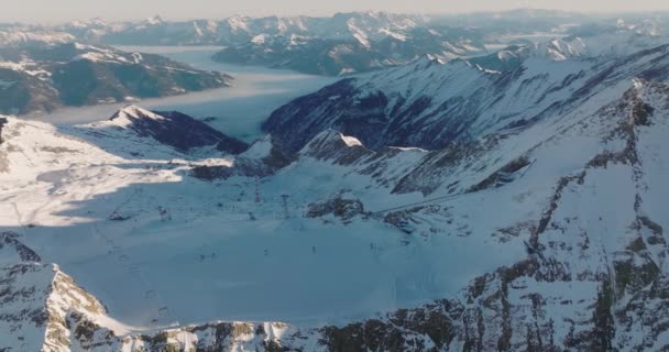 Wide Drone Flight Winter Arcing Ski Slope Kitzsteinhorn Mountain High — Stock videók