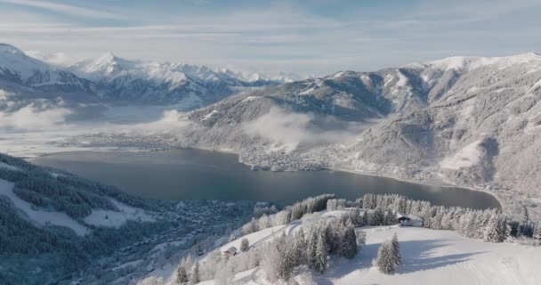 Wide Arcing Drone Snow Covered Mountains Zell See Kaprun Lake — Stockvideo