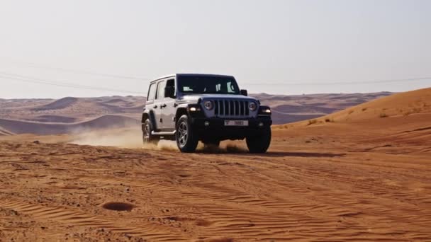 Wide Slow Motion Tracking Shot Jeep Driving Desert Dubai — Stockvideo